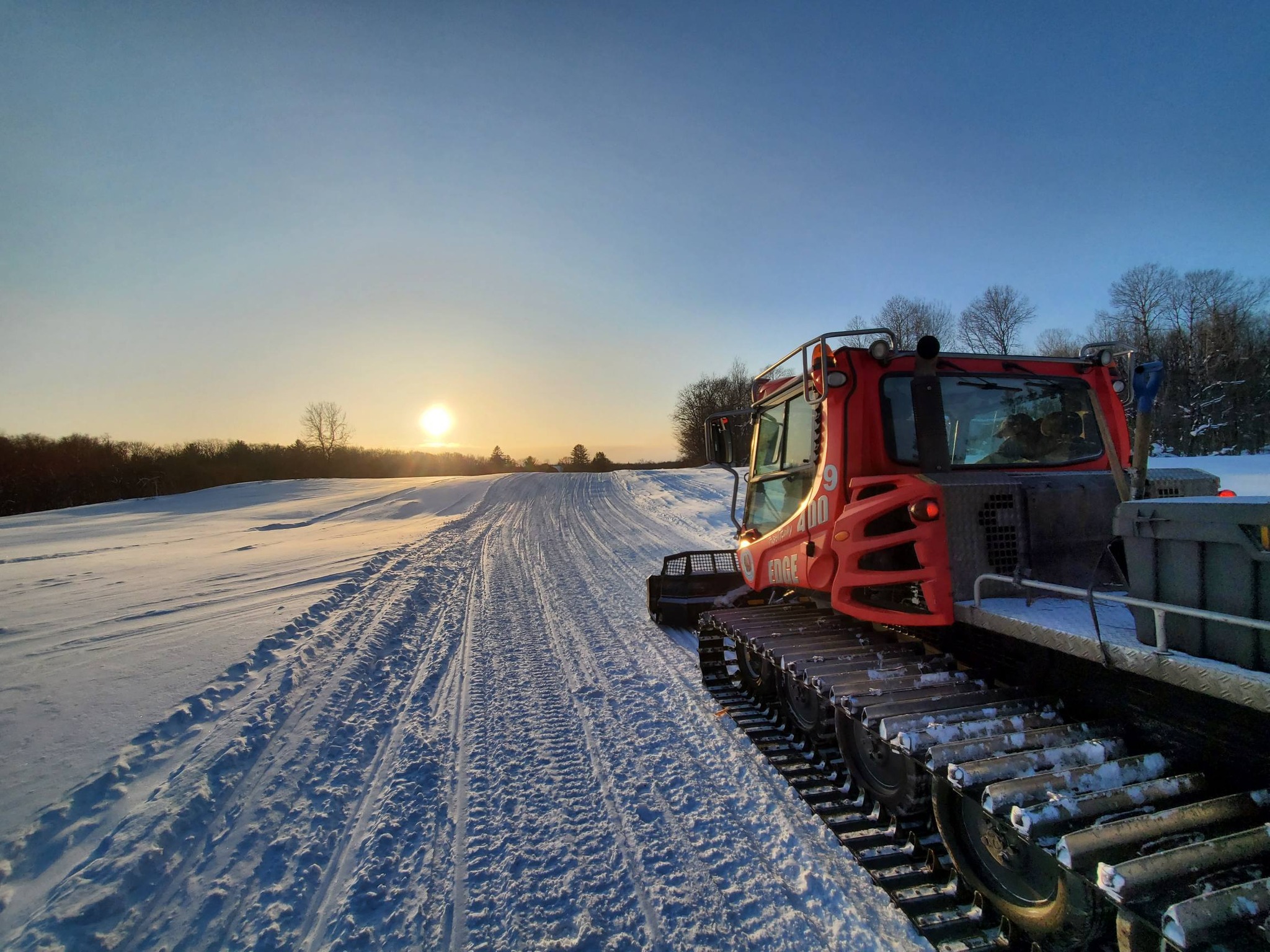 Osceola Snowmobile Association Groomer Sunset February 2026